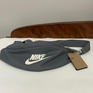 Nike Heritage Waistpack in a charcoal grey colorway.